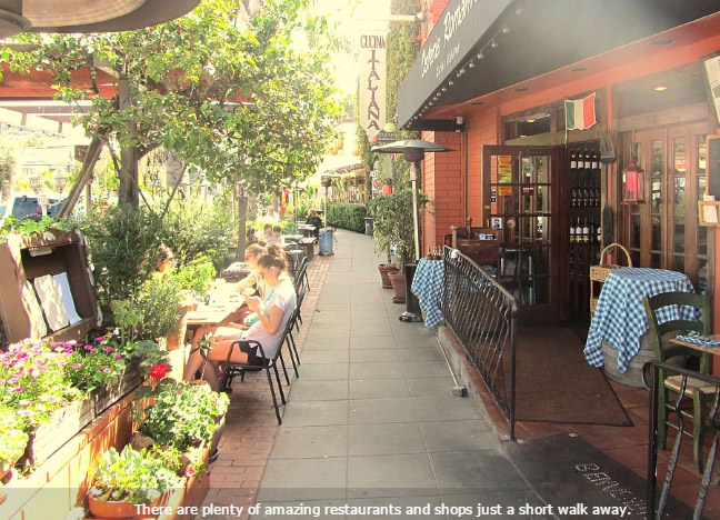 Outdoor caf with dining along the sidewalk.